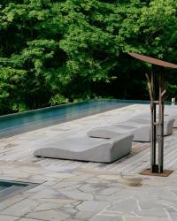 Poolside relaxation area at BALNEA - Balnea Spa